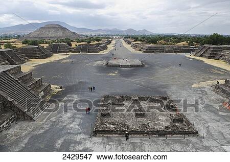 Stock Photo - View of the Avenue of the Dead and the Pyramid of the Sun, from the Pyramid of the Moon, at Pyramids of Teotihuacan; San Juan Teotihuacan, State of Mexico, Mexico. Fotosearch