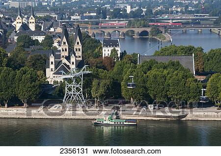 View of the city of Koblenz and a boat in the river; Koblenz, Rhineland-Palatinate, Germany View Large Photo Image Stock Image - View of the city of Koblenz and a boat in the river; Koblenz, Rhineland-Palatinate, Germany. Fotosearch