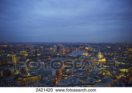 View of the city of London and River Thames at dusk; London, England View Large Photo Image Stock Image - View of the city of London and River Thames at dusk; London, England. Fotosearch