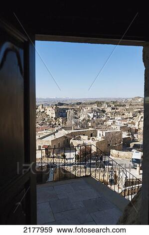 Stock Photo - View Of The City Of Urgup Through A Doorway; Urgup Nevsehir Turkey. Fotosearch
