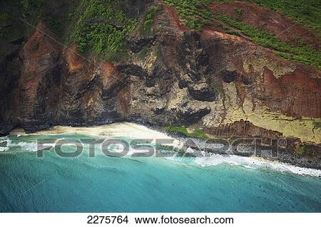 Picture - View of the coastline of an hawaiian island; Na Pali coast of Kauai, Hawaii, United States of America. Fotosearch