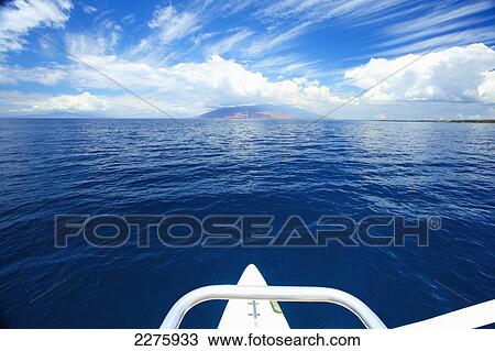 View of the coastline of an hawaiian island from the bow of a boat; Hawaii, United States of America View Large Photo Image Stock Image - View of the coastline of an hawaiian island from the bow of a boat; Hawaii, United States of America. Fotosearch