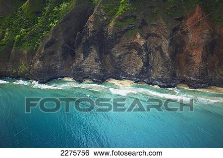 View of the coastline of an hawaiian island; Na Pali coast of Kauai, Hawaii, United States of America View Large Photo Image Stock Photograph - View of the coastline of an hawaiian island; Na Pali coast of Kauai, Hawaii, United States of America. Fotosearch