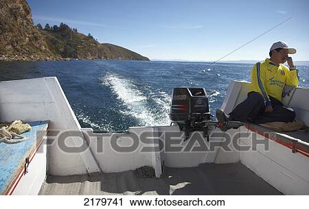 Stock Image - View Of The Island Of The Sun From Ferry Lake Titicaca Bolivia. Fotosearch