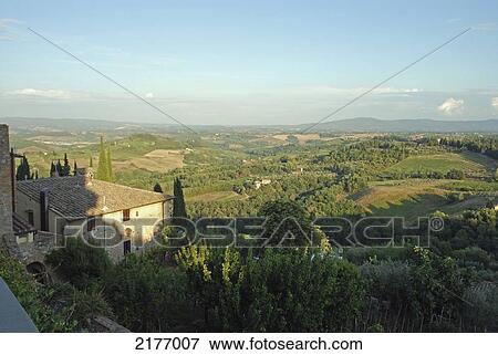 View Of The Landscape From A Building; San Gimignano Tuscany Italy View Large Photo Image Stock Photo - View Of The Landscape From A Building; San Gimignano Tuscany Italy. Fotosearch