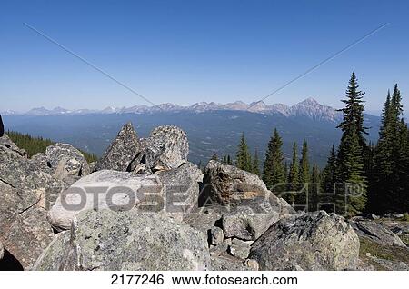 View Of The Peaks Of The Canadian Rocky Mountains; Alberta Canada View Large Photo Image Stock Photograph - View Of The Peaks Of The Canadian Rocky Mountains; Alberta Canada. Fotosearch