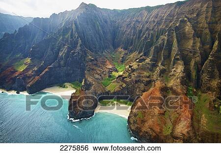 View of the rugged coastline along a hawaiian island, Na Pali coast; Kauai, Hawaii, United States of America View Large Photo Image Stock Photograph - View of the rugged coastline along a hawaiian island, Na Pali coast; Kauai, Hawaii, United States of America. Fotosearch