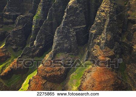 Stock Photography - View of the rugged coastline along a hawaiian island, Na Pali coast; Kauai, Hawaii, United States of America. Fotosearch