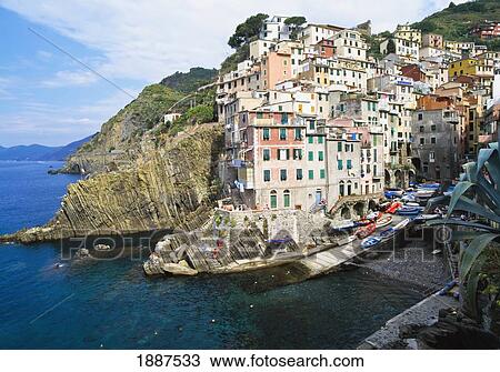 Stock Image - View Of The Village Of Riomaggiore Built Over A Cliff.. Fotosearch