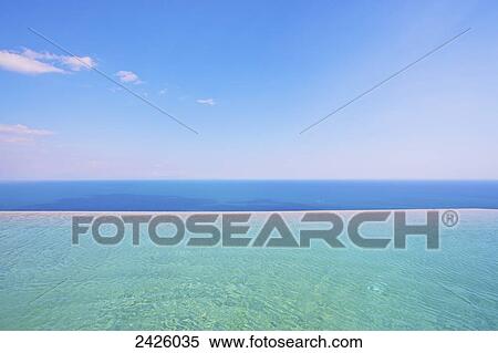 Stock Photography - View of the water of the Sorrentine Peninsula from the swimming pool of Monastero Santa Rosa Hotel and Spa, Amalfi coast; Italy. Fotosearch