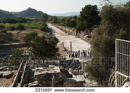 View of Tourists and guide at top of Harbor Street; Ephesus, Izmir, Turkey View Large Photo Image Stock Photo - View of Tourists and guide at top of Harbor Street; Ephesus, Izmir, Turkey. Fotosearch
