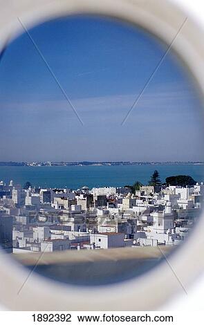 View Of Townscape Through Circular Window View Large Photo Image Stock Image - View Of Townscape Through Circular Window. Fotosearch