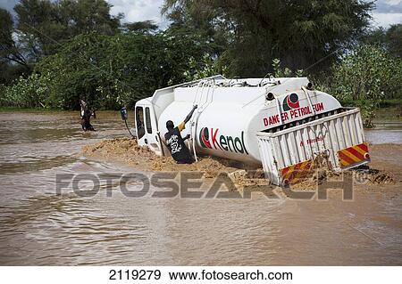 View of truck crossing river; Kenya View Large Photo Image Stock Photo - View of truck crossing river; Kenya. Fotosearch