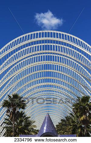 Stock Photograph - View Of Umbracle, Sculpture And Palm Trees In Ciudad De Las Artes Y Las Ciencias (City Of Arts And Sciences); Valencia, Spain. Fotosearch