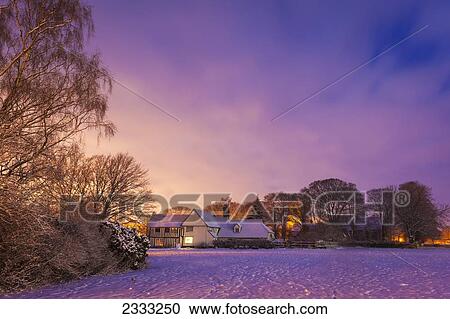 Stock Image - View Of Village At Night; Great Wilbraham, Cambridgeshire, United Kingdom. Fotosearch