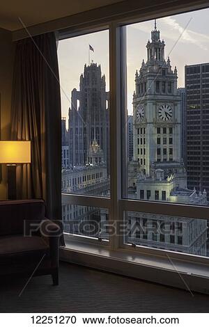 View of Wrigley Building and Tribune Tower (with flag) from 20th-floor bedroom at Trump International Hotel and Tower; Chicago, Illinois, United States of America View Large Photo Image Stock Image - View of Wrigley Building and Tribune Tower (with flag) from 20th-floor bedroom at Trump International Hotel and Tower; Chicago, Illinois, United States of America. Fotosearch