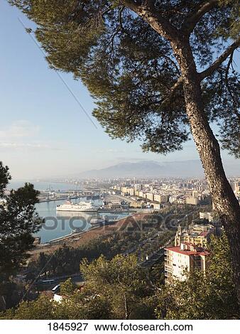 Stock Photo - View Over Bullring, City And Port; Malaga, Malaga Province, Costa Del Sol, Spain. Fotosearch