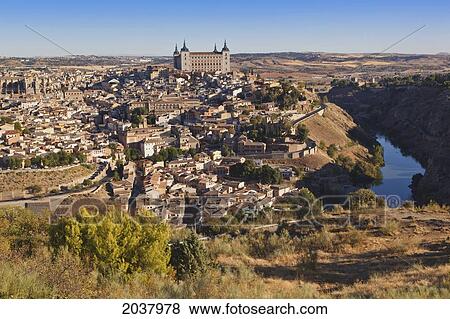 Stock Photo - View Over City Showing The Alcazar And The Tagus River; Toledo Toledo Province Castilla- La Mancha Spain. Fotosearch