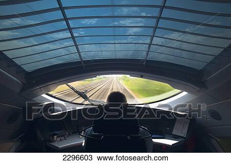Stock Image - View over driver in ICE (Inter City Express) train; Germany. Fotosearch