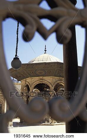 Stock Photography - View Through A Gate Of A Fountain In Muhammad Ali Mosque Courtyard, Citadel, Cairo, Egypt; Citadel, Cairo, Egypt. Fotosearch