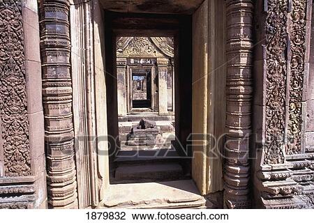 Stock Image - View Through Ornate Doorways At Banteay Srey. Fotosearch