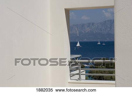 Stock Photography - View Through Window Towards One Of The Ionian Islands.. Fotosearch