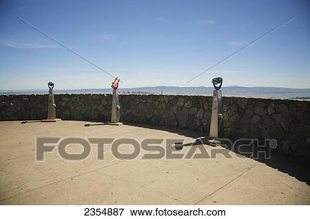 Stock Photo - Viewers At Twin Peaks Overlooking San Francisco Bay; San Francisco, California, Usa. Fotosearch