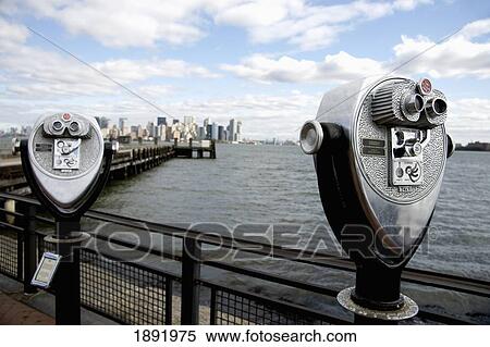 Stock Photography - Viewing Telescopes On Liberty Island. Fotosearch