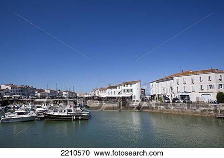 Views around marina and Harbour town of St Martin de Re, Ile De Re, France View Large Photo Image Stock Image - Views around marina and Harbour town of St Martin de Re, Ile De Re, France. Fotosearch