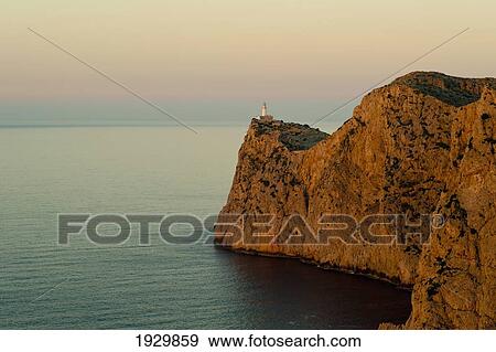 Stock Photo - Views Of The Lighthouse At Sunset, Cap De Formentor, Mallorca, Balearic Islands, Spain. Fotosearch