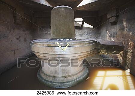 Vijayanagara ruins, Shiva Lingam; Hampi, Karnataka, India View Large Photo Image Stock Photograph - Vijayanagara ruins, Shiva Lingam; Hampi, Karnataka, India. Fotosearch