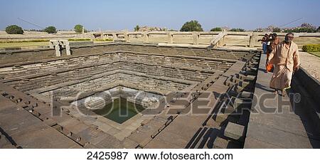 Vijayanagara ruins, Step well; Hampi, Karnataka, India View Large Photo Image Stock Photo - Vijayanagara ruins, Step well; Hampi, Karnataka, India. Fotosearch