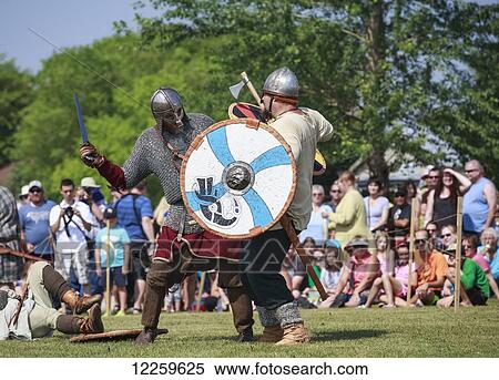 Viking battle reenactment at the Icelandic Festival of Manitoba; Gimli, Manitoba, Canada View Large Photo Image Stock Photography - Viking battle reenactment at the Icelandic Festival of Manitoba; Gimli, Manitoba, Canada. Fotosearch