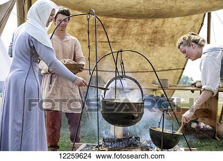 Viking women cooking at the Icelandic Festival of Manitoba; Gimli, Manitoba, Canada View Large Photo Image Picture - Viking women cooking at the Icelandic Festival of Manitoba; Gimli, Manitoba, Canada. Fotosearch