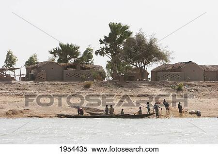 Village along the shores of the Niger River between Mopti and Lake Debo, Mali View Large Photo Image Stock Photography - Village along the shores of the Niger River between Mopti and Lake Debo, Mali. Fotosearch