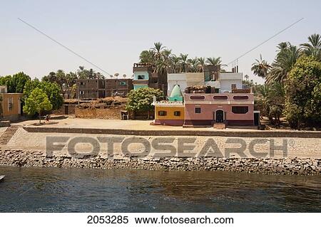 Village By The Shore Of The Nile River Between Aswan And Edfu, Aswan, Egypt View Large Photo Image Stock Photography - Village By The Shore Of The Nile River Between Aswan And Edfu, Aswan, Egypt. Fotosearch