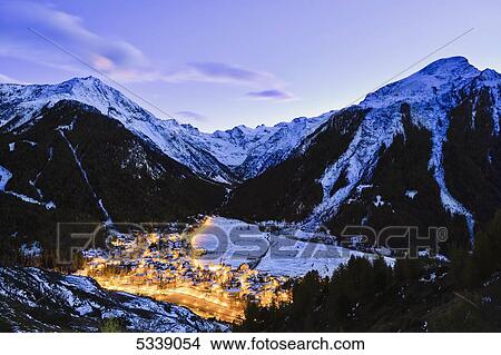 Picture - Village of Cogne at dusk, Gran Paradiso National Park; Cogne, Italy. Fotosearch