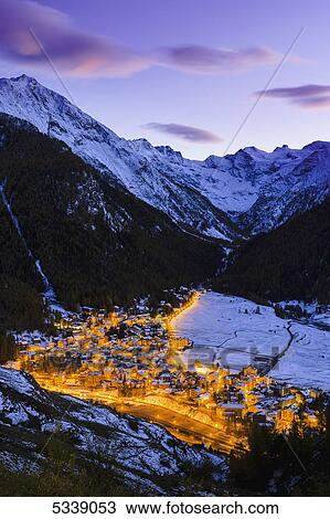 Village of Cogne at dusk, Gran Paradiso National Park; Cogne, Italy View Large Photo Image Stock Image - Village of Cogne at dusk, Gran Paradiso National Park; Cogne, Italy. Fotosearch