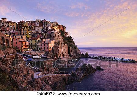 Village of Manarola at sunset, Cinque Terre; Manarola, Liguria, Italy View Large Photo Image Stock Image - Village of Manarola at sunset, Cinque Terre; Manarola, Liguria, Italy. Fotosearch
