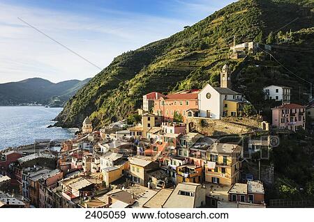 Village of Vernazza at sunset, Cinque Terre; Vernazza, Liguria, Italy View Large Photo Image Stock Photo - Village of Vernazza at sunset, Cinque Terre; Vernazza, Liguria, Italy. Fotosearch