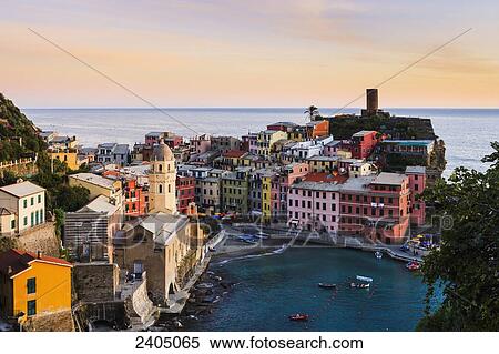 Village of Vernazza at sunset, Cinque Terre; Vernazza, Liguria, Italy View Large Photo Image Stock Photography - Village of Vernazza at sunset, Cinque Terre; Vernazza, Liguria, Italy. Fotosearch