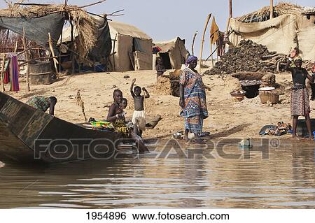 Village people along the shores of the Niger River between Mopti and Lake Debo, Mali View Large Photo Image Stock Photograph - Village people along the shores of the Niger River between Mopti and Lake Debo, Mali. Fotosearch