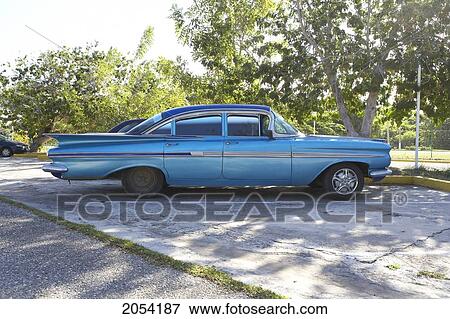 Vintage Car, Camaquey, Cuba View Large Photo Image Stock Photo - Vintage Car, Camaquey, Cuba. Fotosearch