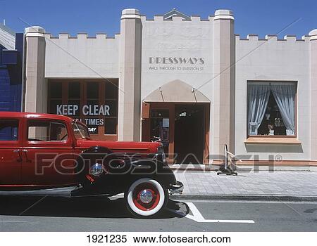 Vintage Car Outside Art Deco Building; North Island, New Zealand View Large Photo Image Stock Photography - Vintage Car Outside Art Deco Building; North Island, New Zealand. Fotosearch