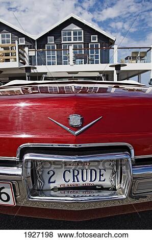 Stock Photo - Vintage Car Outside Building, West Jutland, Denmark. Fotosearch