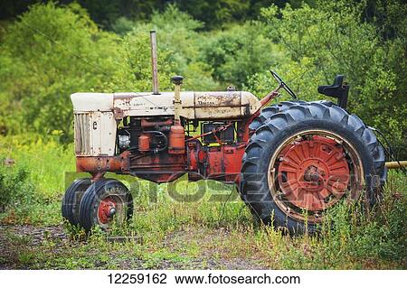 Vintage red tractor; Knoxville, Pennsylvania, United States of America View Large Photo Image Stock Image - Vintage red tractor; Knoxville, Pennsylvania, United States of America. Fotosearch