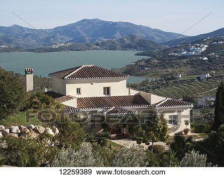 Stock Photo - Vinuela Lake and Sierras de Tejeda mountains, Vinuela, near Malaga; Andalusia, Spain. Fotosearch