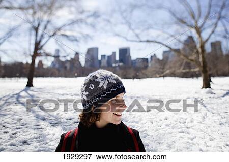 Stock Photo - Visitor to Central Park in winter, New York. USA.. Fotosearch