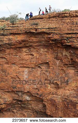 Stock Photo - Visitors at Kings Canyon; Northern Territory, Australia. Fotosearch