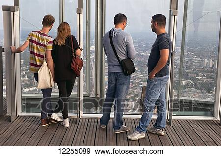 Visitors on the viewing platform of the Shard building; London, England View Large Photo Image Stock Photo - Visitors on the viewing platform of the Shard building; London, England. Fotosearch